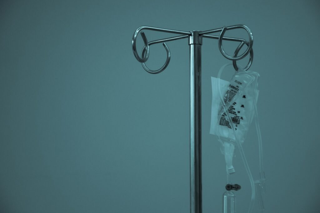 IV drip bag on a stand at an IV therapy clinic