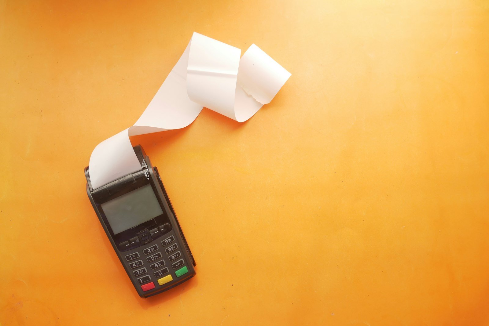 Payment terminal printing a sales receipt