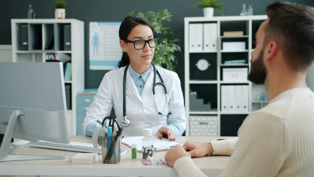 Wellness clinic provider meeting with a patient